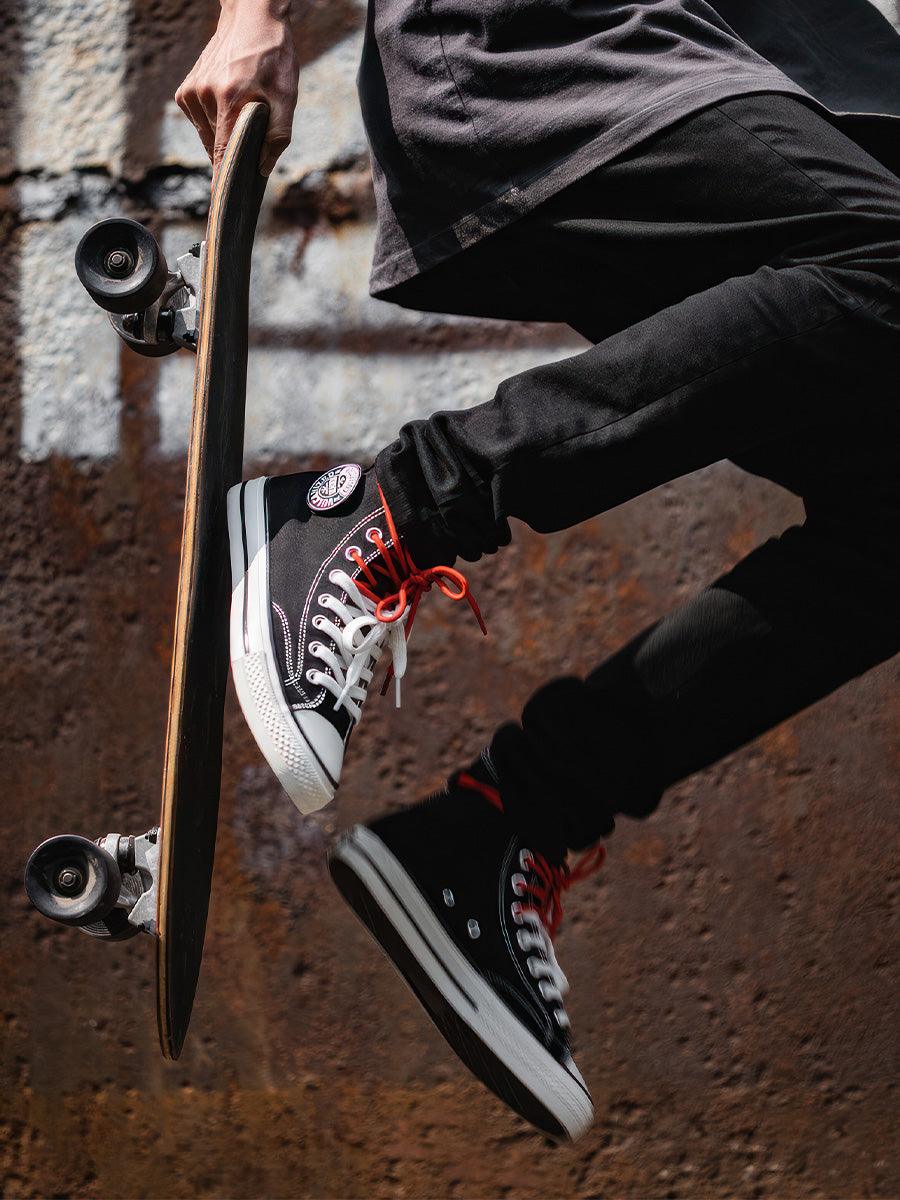 black high top velcro sneakers